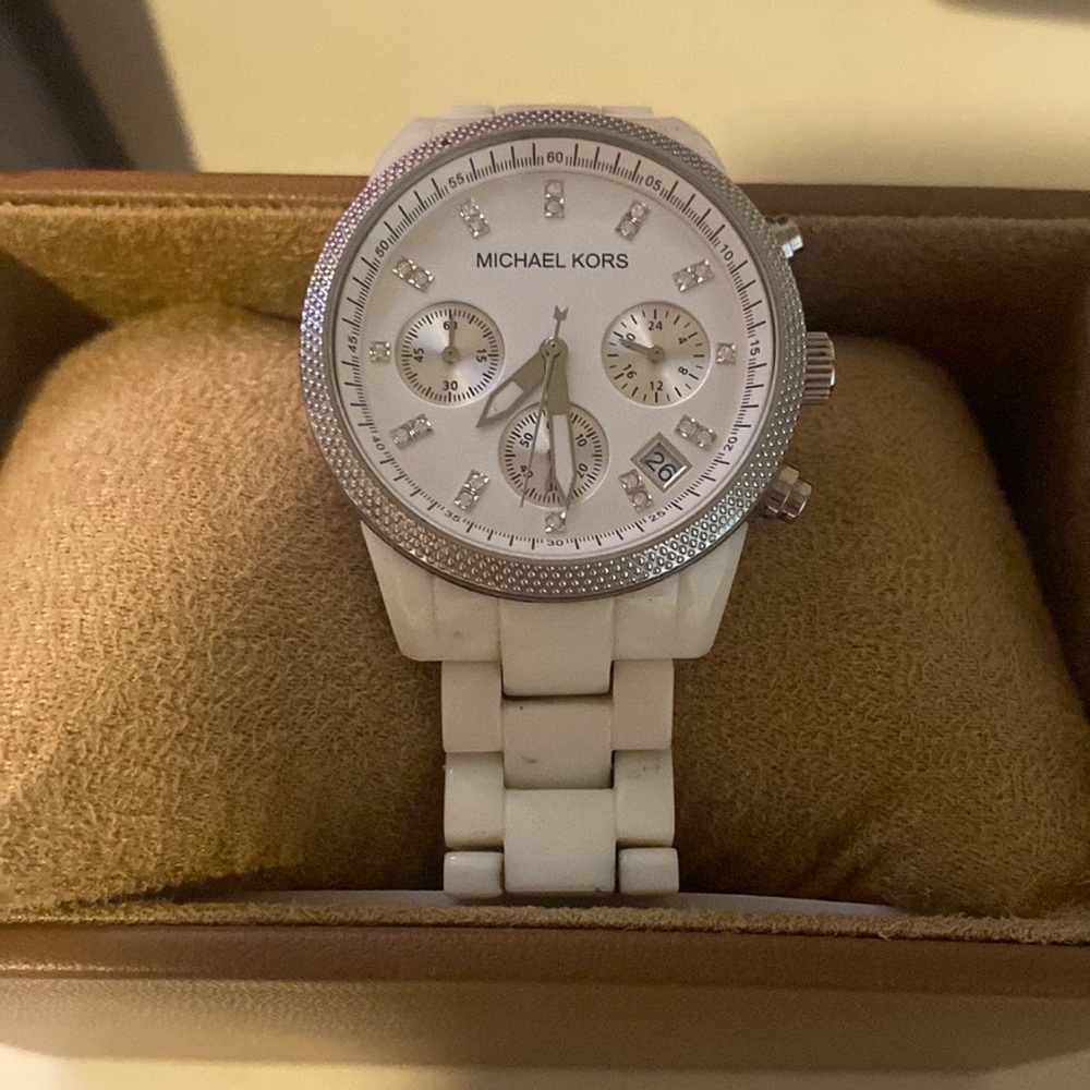 Stainless steel Michael Kors watch with white adjustable band